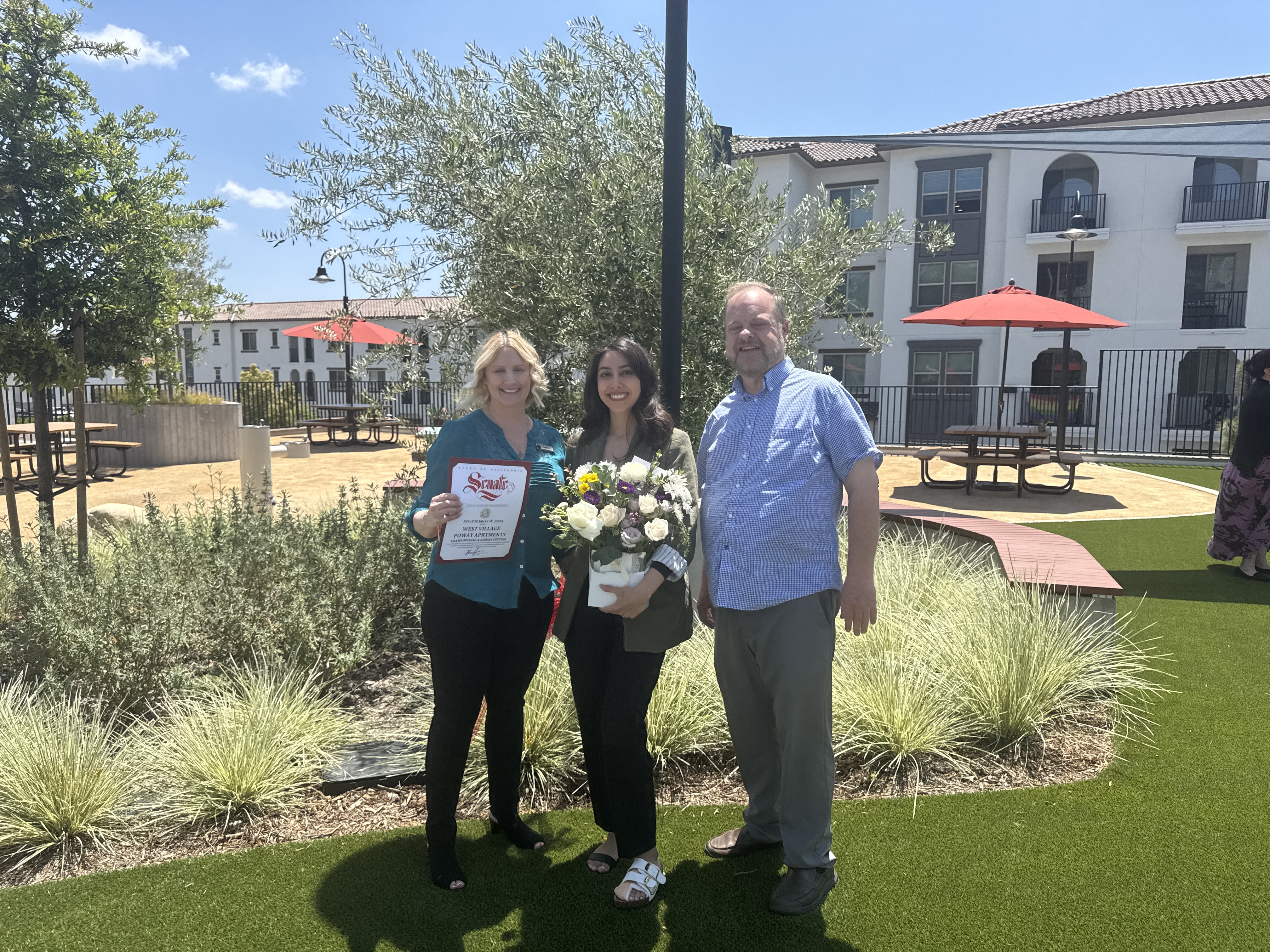 Community associates at the West Village Poway playground area.