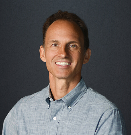 Headshot of Paul Kudirka looking at camera.